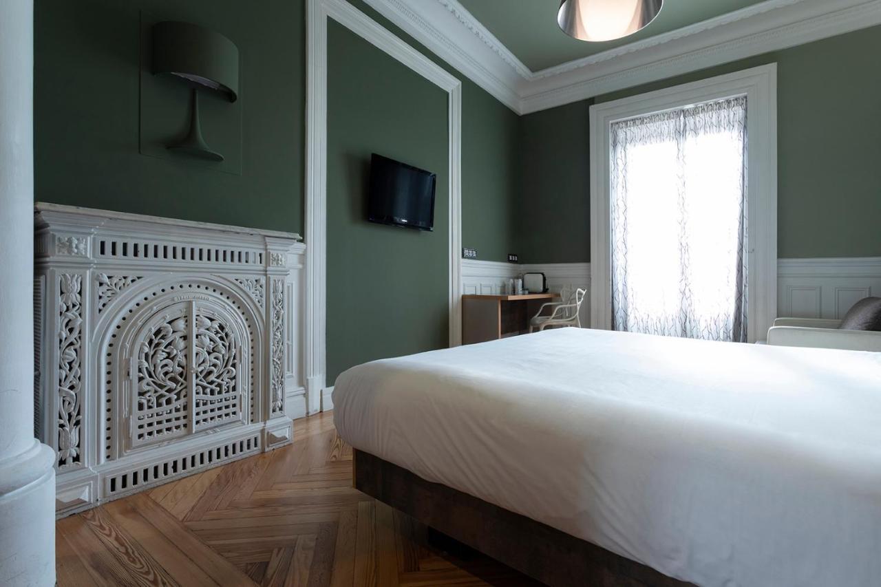 Kamer met 1 Groot Bed of 2 Aparte Bedden en Uitzicht op de Stad